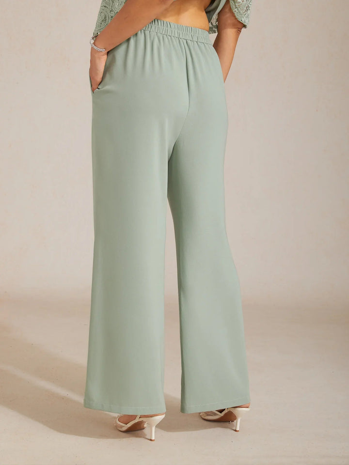 Mid-Rise Broek met Elastische Taille, Wijde Pijpen en Zakken