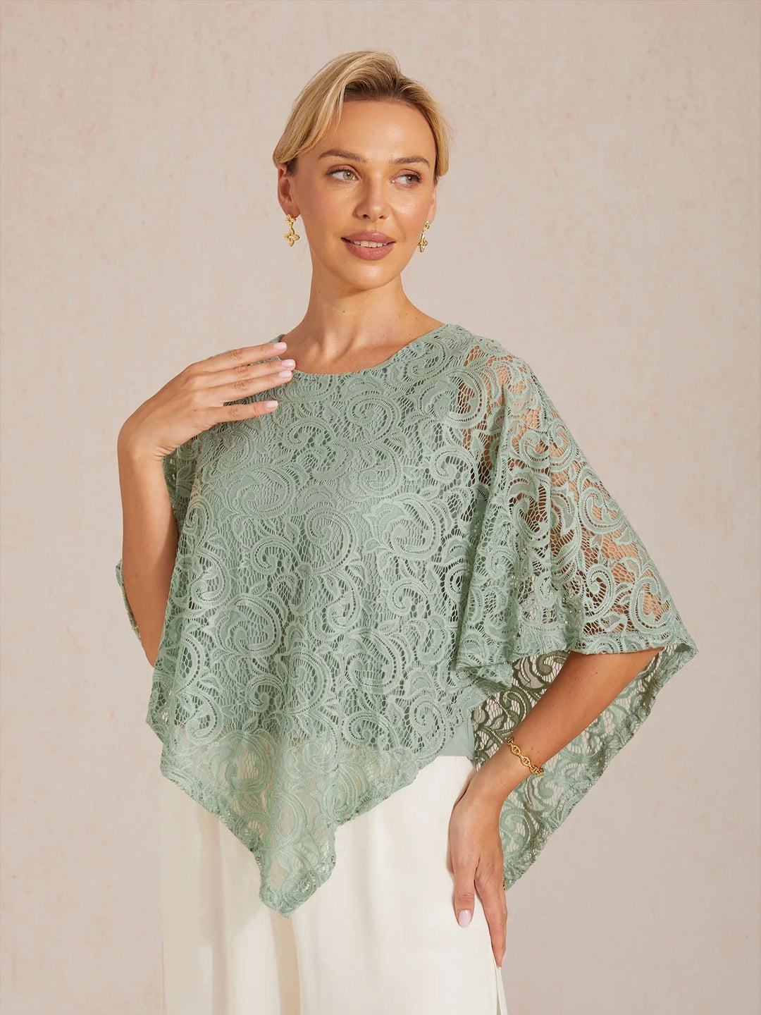 Elegante kanten top met vleermuismouwen