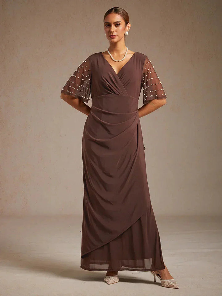Elegante Formele Jurk met Versierde Fladdermouwen