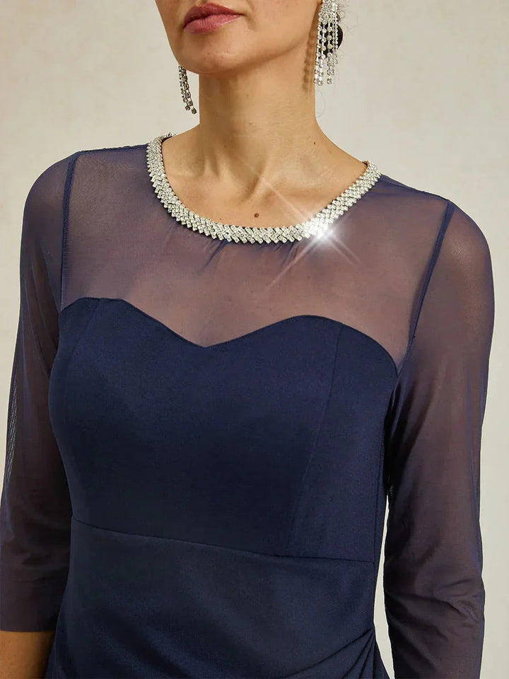 Elegante formele jurk met kralen en illusiehalslijn