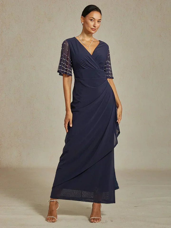 Elegante Formele Jurk met Versierde Fladdermouwen
