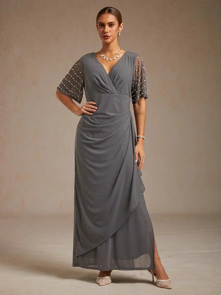 Elegante Formele Jurk met Versierde Fladdermouwen