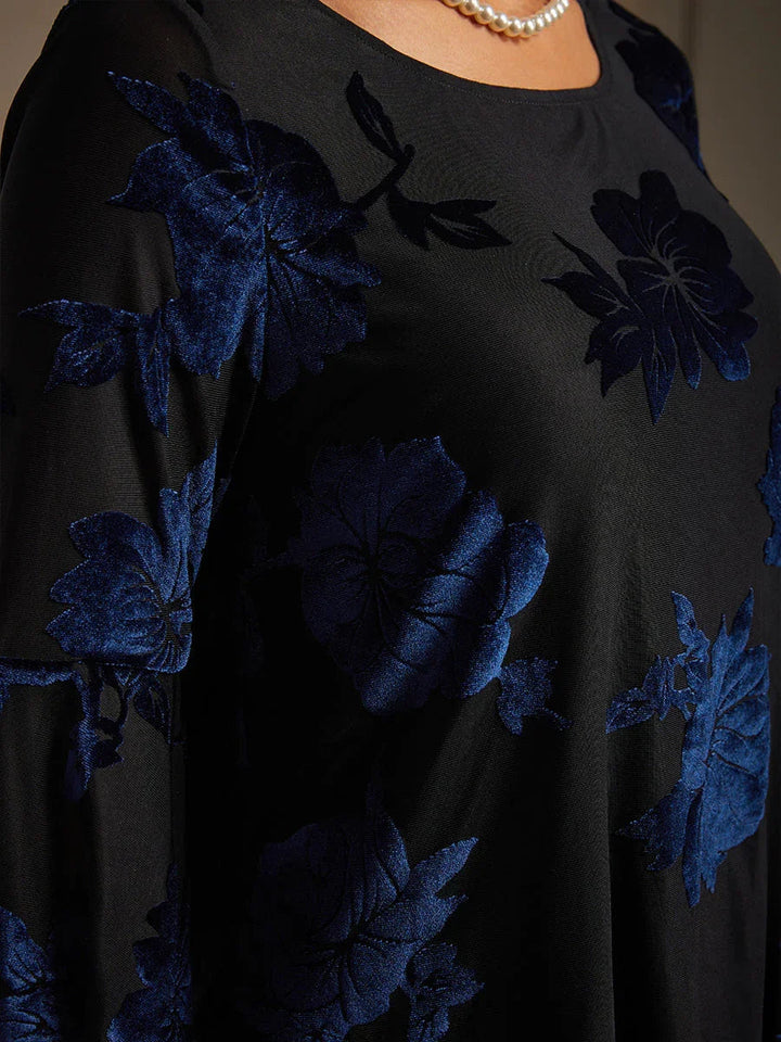 Chique Bloemige Blouse met Asymmetrische Zoom