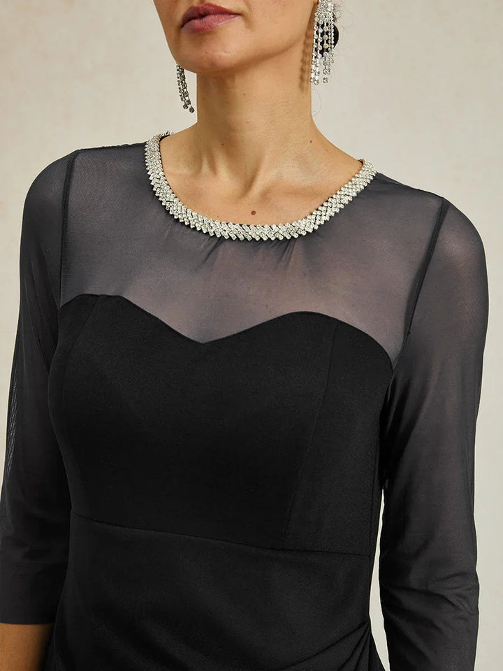 Elegante formele jurk met kralen en illusiehalslijn