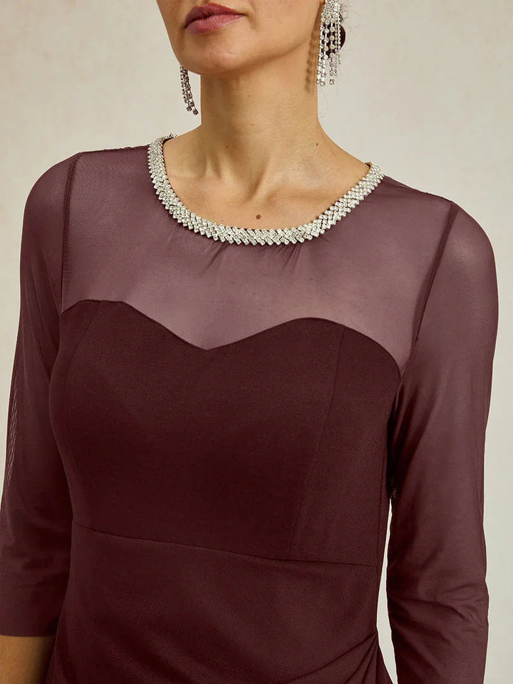 Elegante formele jurk met kralen en illusiehalslijn