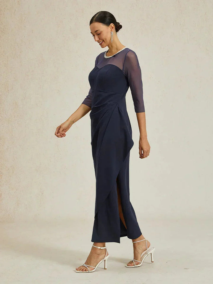 Elegante formele jurk met kralen en illusiehalslijn