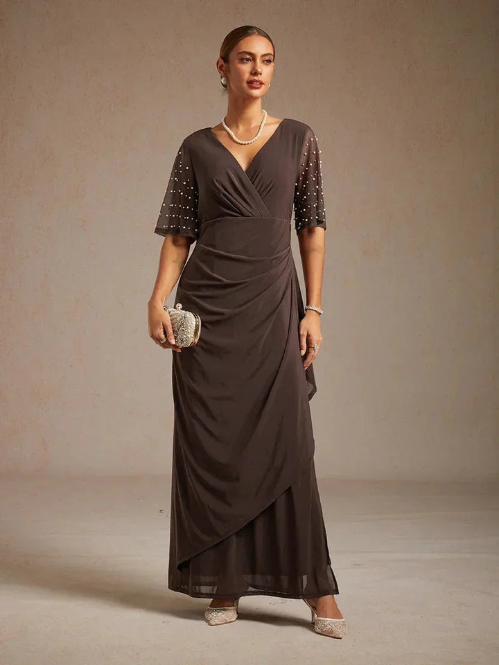 Elegante Formele Jurk met Versierde Fladdermouwen