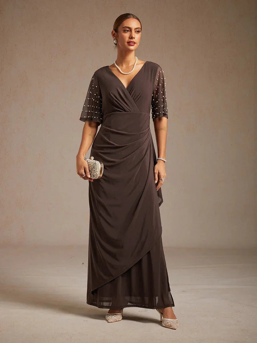 Elegante Formele Galajurk met Versierde Fladdermouwen