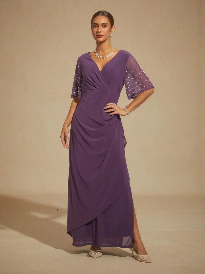 Elegante Formele Galajurk met Versierde Fladdermouwen
