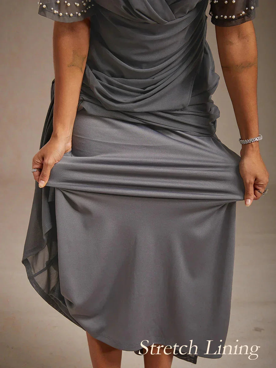 Elegante Formele Galajurk met Versierde Fladdermouwen