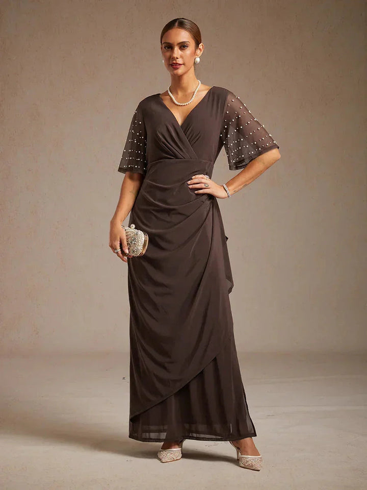 Elegante Formele Jurk met Versierde Fladdermouwen