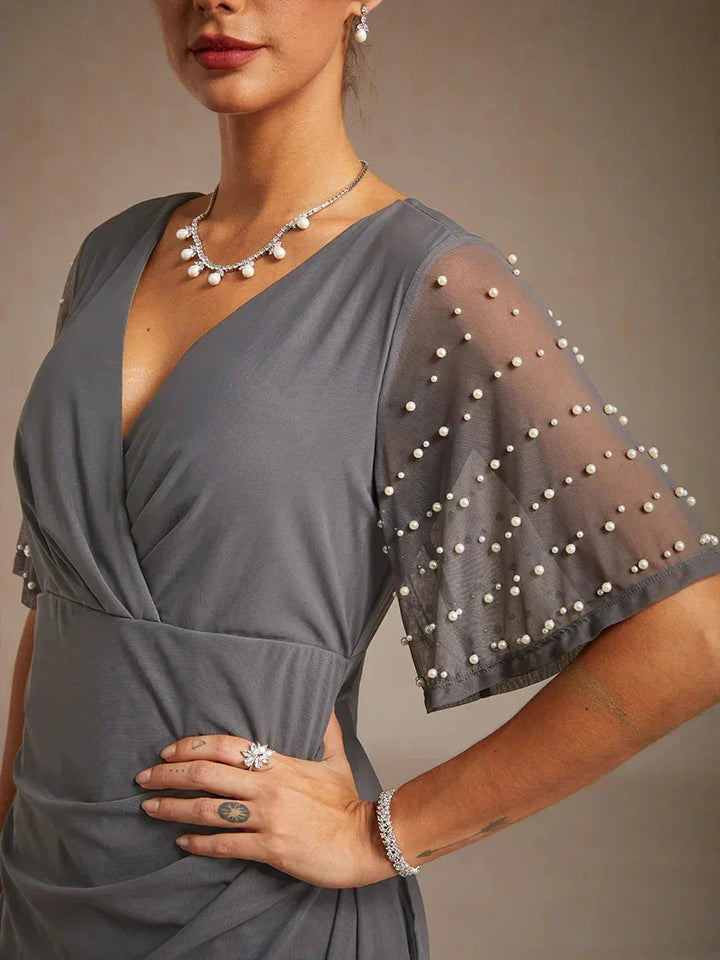 Elegante Formele Jurk met Versierde Fladdermouwen
