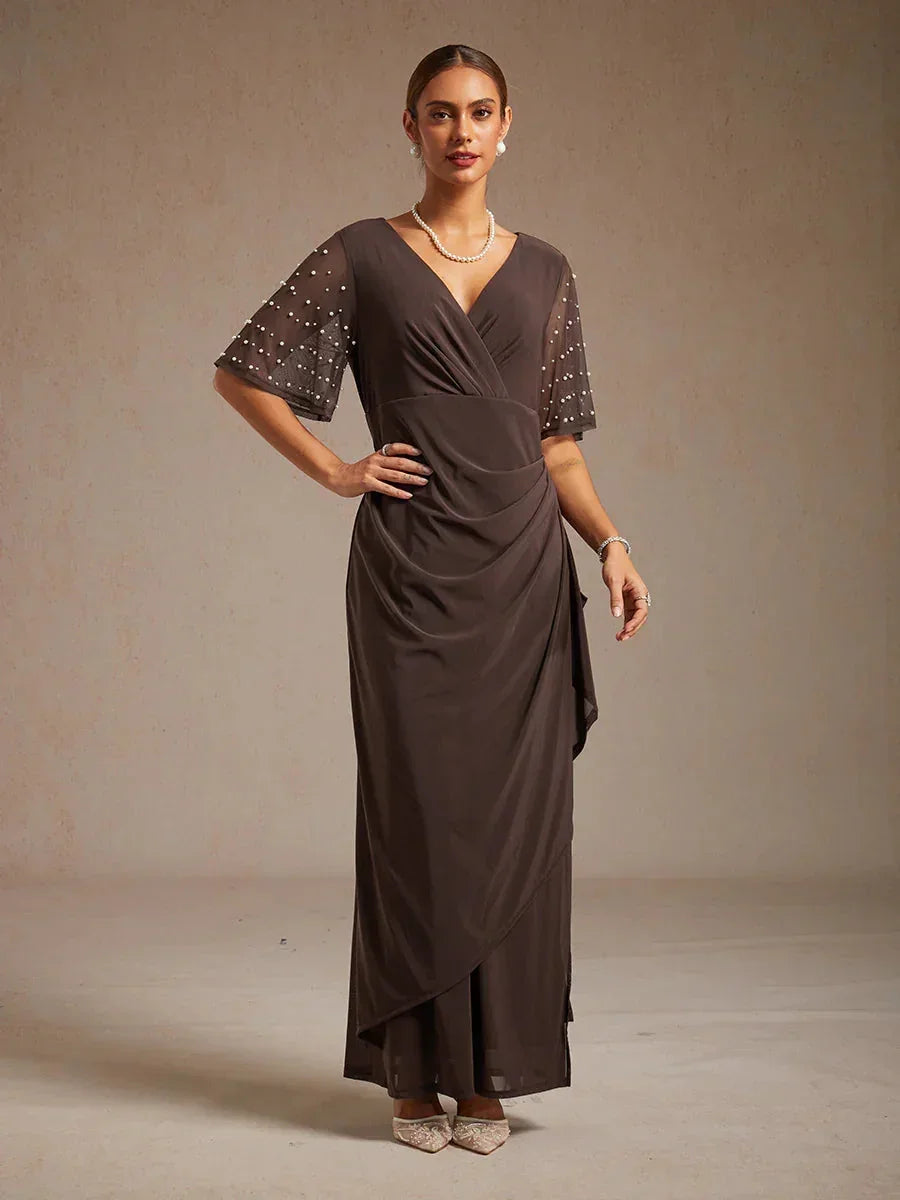 Elegante Formele Galajurk met Versierde Fladdermouwen