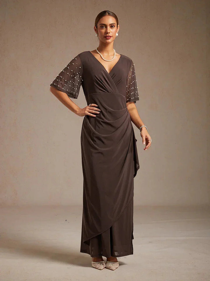 Elegante Formele Galajurk met Versierde Fladdermouwen