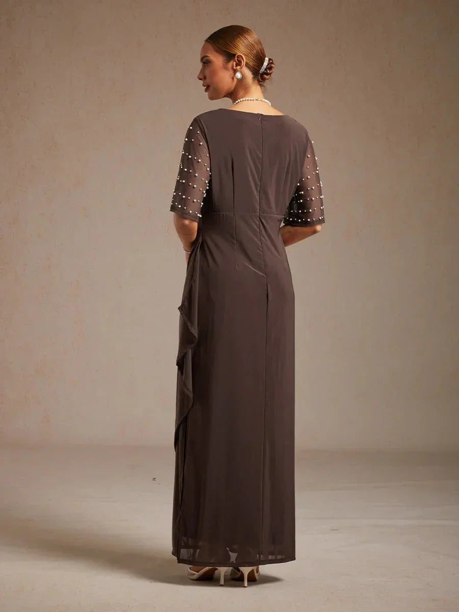 Elegante Formele Galajurk met Versierde Fladdermouwen