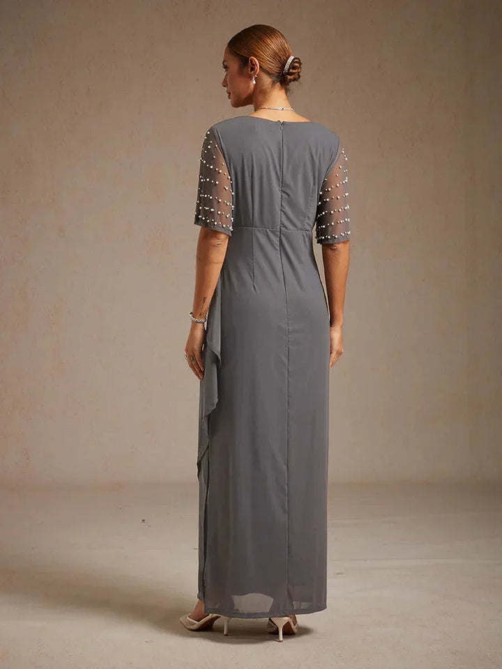 Elegante Formele Jurk met Versierde Fladdermouwen