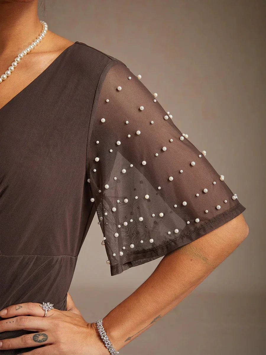 Elegante Formele Jurk met Versierde Fladdermouwen