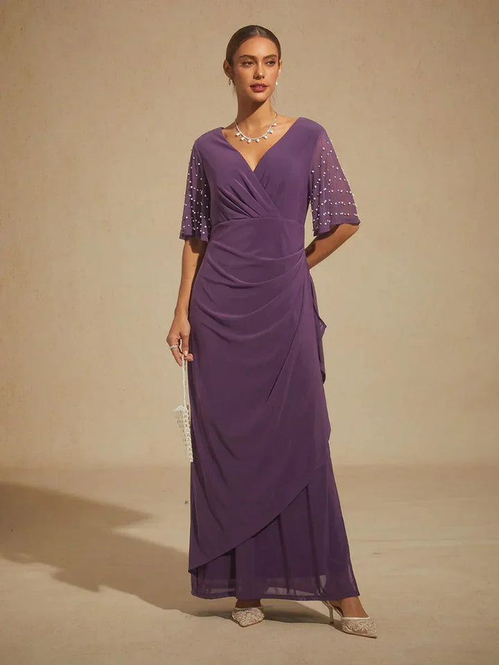 Elegante Formele Jurk met Versierde Fladdermouwen