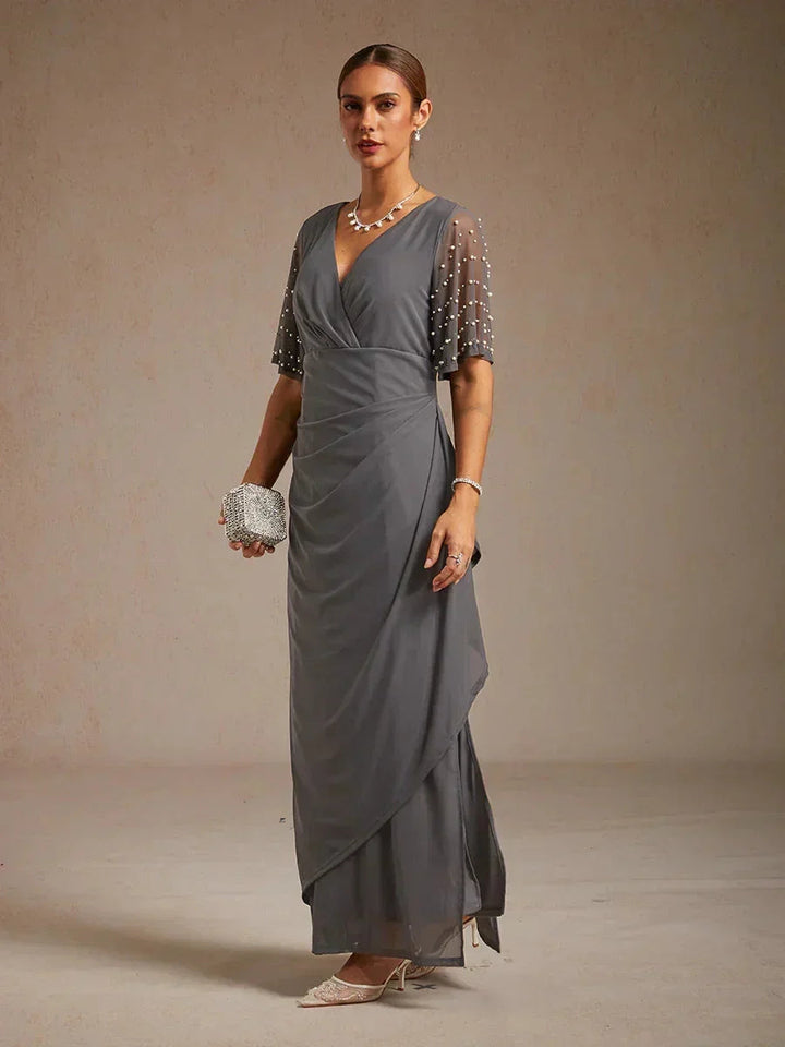 Elegante Formele Jurk met Versierde Fladdermouwen