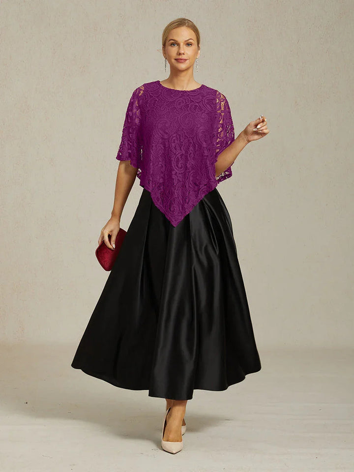 Elegante kanten top met vleermuismouwen