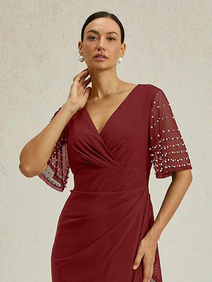 Elegante Formele Jurk met Versierde Fladdermouwen
