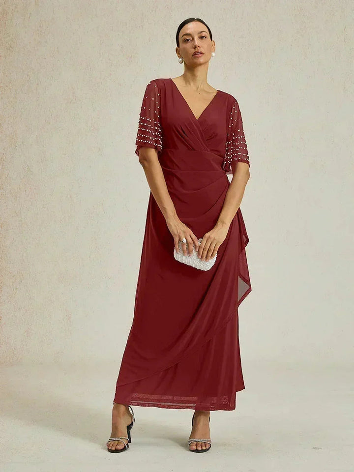 Elegante Formele Jurk met Versierde Fladdermouwen
