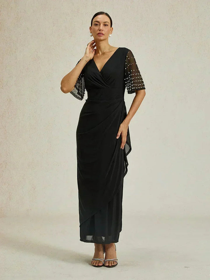 Elegante Formele Galajurk met Versierde Fladdermouwen
