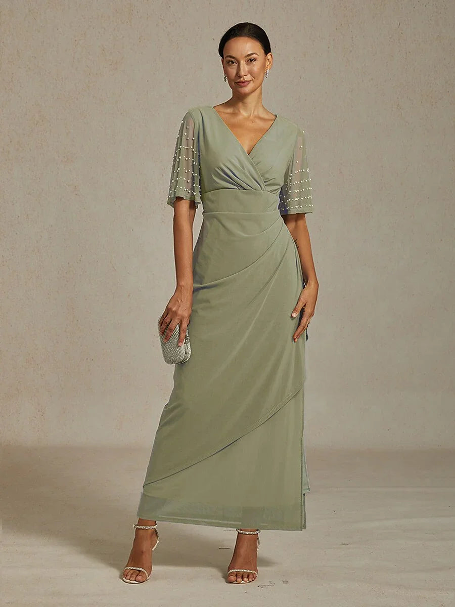 Elegante Formele Galajurk met Versierde Fladdermouwen