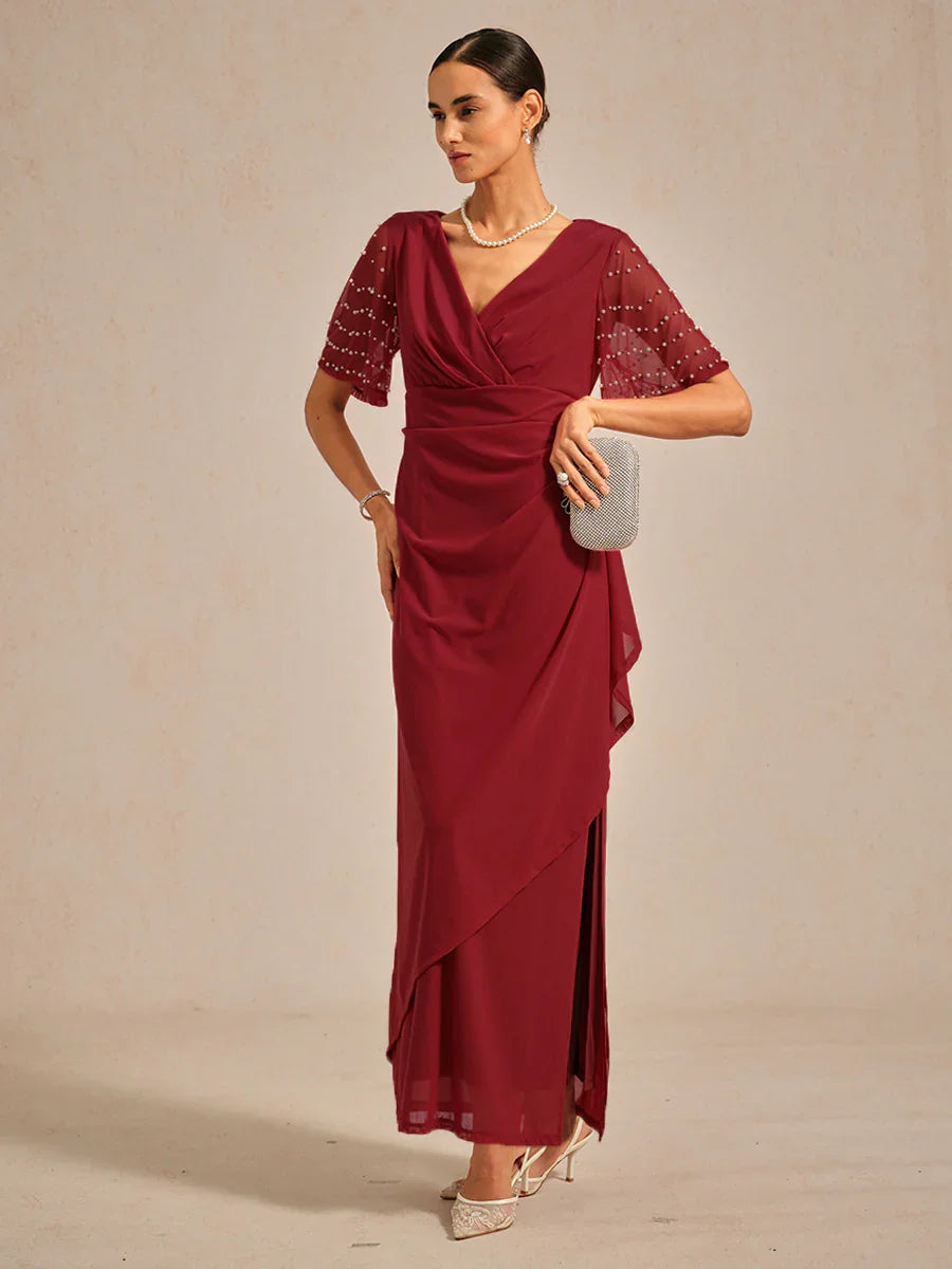 Elegante Galajurk Met Versierde Fladdermouwen